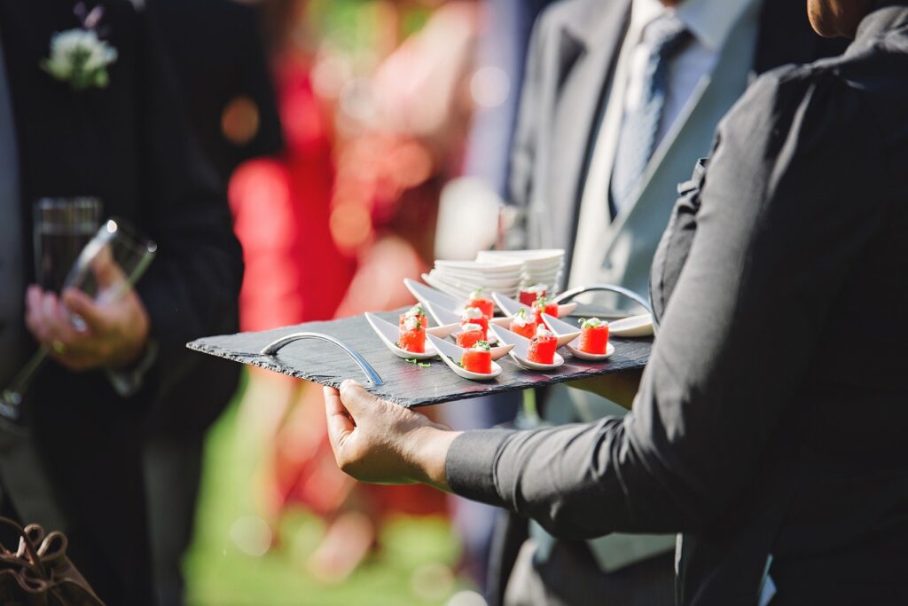 hands holding plate, food, snack